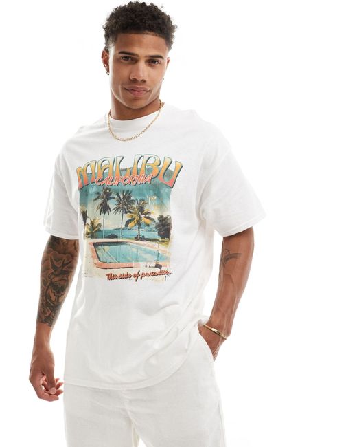 T-shirt oversize à imprimé malibu sur le devant ASOS pour homme en coloris White