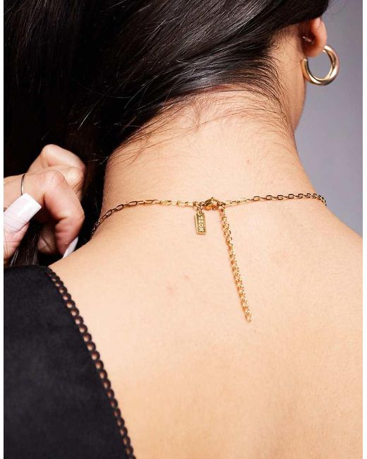 Neck On The Line Vergulde Ketting Met Versierde Zeester- En Schelphangertjes in het Natural