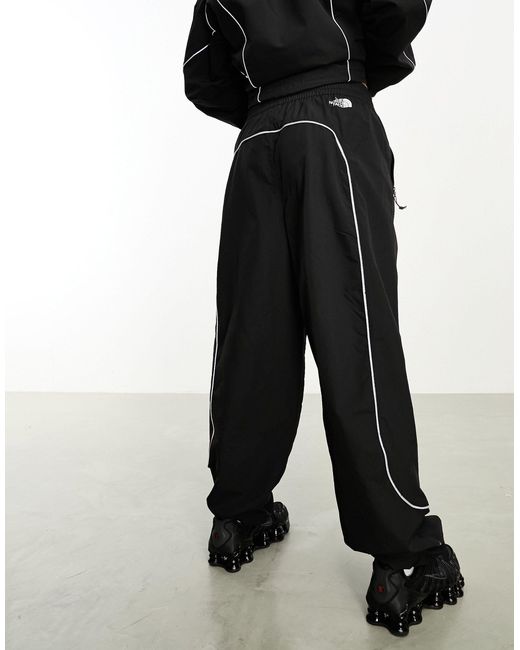 The North Face Black Tek Woven Track Pants With Reflective Piping