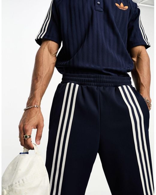 Adidas Originals Adicolor - 70's King - Trainingsbroek in het Blue