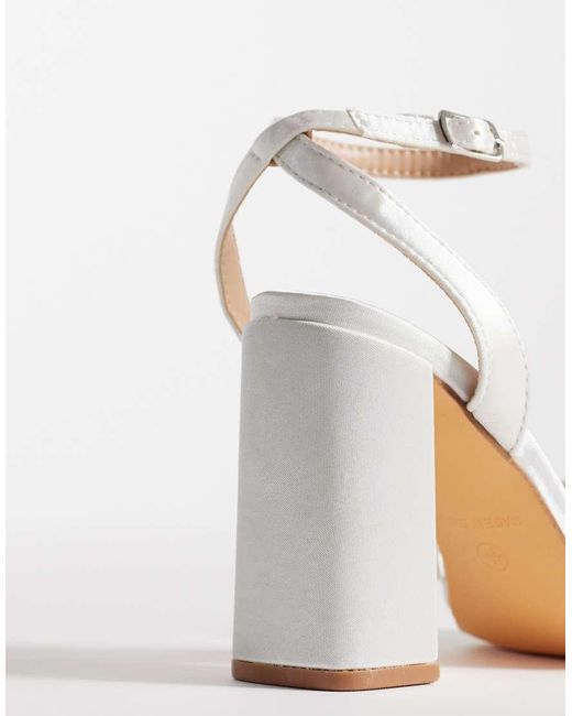 Clark di SEQWL in White