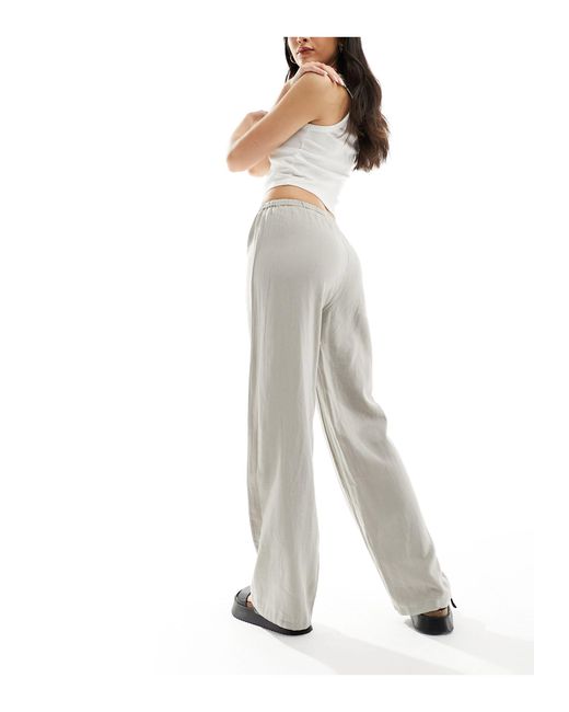 Pantalon taille haute en lin - clair Pull&Bear en coloris White
