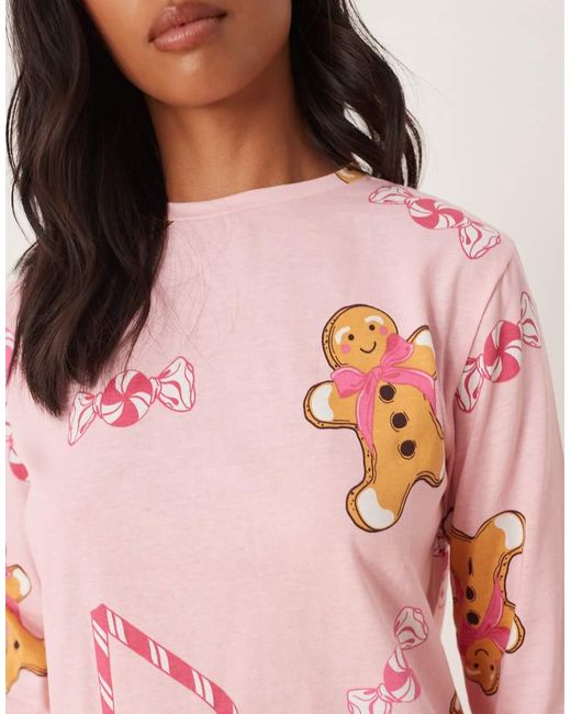 ASOS Pink Asos Design Petite Gingerbread & Candy Cane Long Sleeve Top & Trouser Pyjama Set
