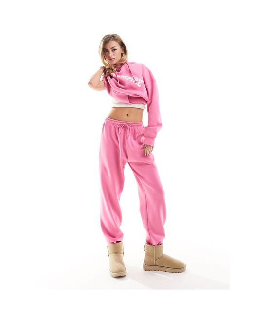 Joggers s con bajos ajustados y logo Missy Empire de color Pink