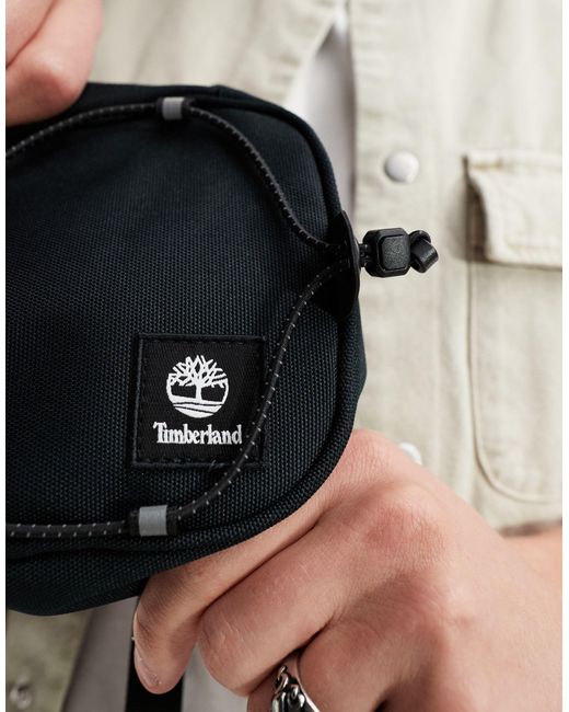 Sac bandoulière fonctionnel à petit logo Timberland pour homme en coloris Black