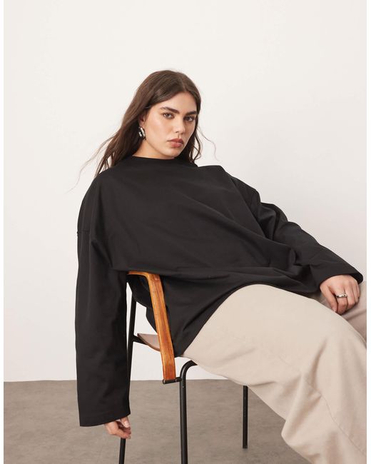 ARRANGE Black Curve – langärmliges oversize-shirt aus baumwolle