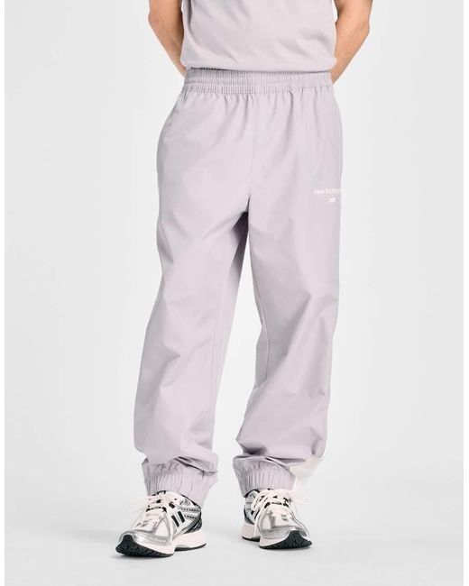 New Balance Gray Trackside Woven Pant for men