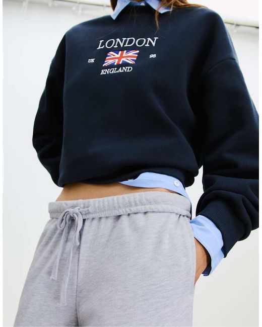 Stradivarius Joggingbroek Met Wijde Pijpen in het White