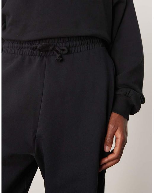 Joggers Negros Básicos Extragrandes De ASOS de hombre de color Black