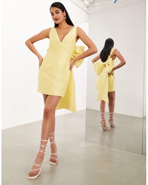 ASOS Yellow Structured Mini Dress With Statement Bow Back Detail