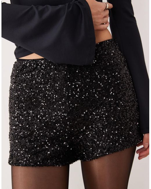 Shorty à sequins Never Fully Dressed en coloris Natural