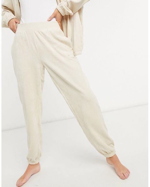 nike cord joggers in cream