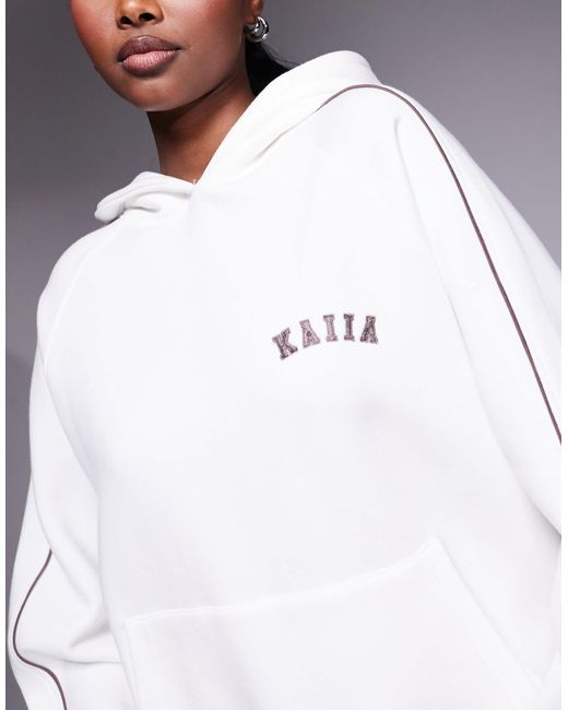 Sweat à capuche d'ensemble oversize en coton majoritaire à broderie logo et bande latérale - blanc Kaiia en coloris Gray