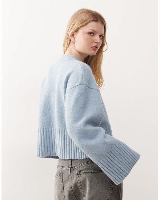 Pull ras Monki en coloris Blue