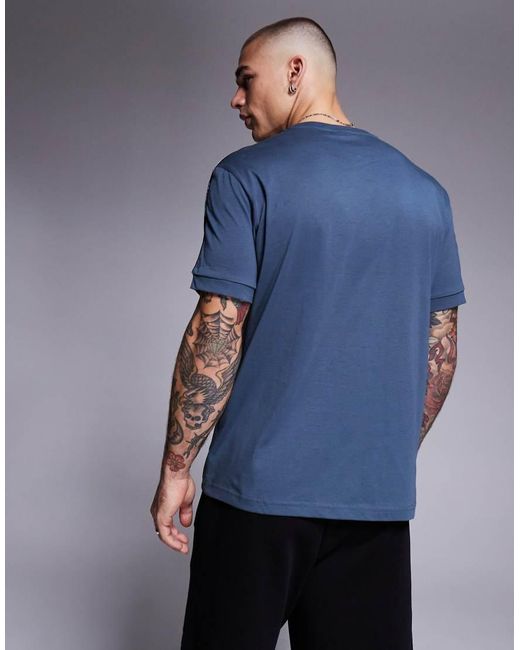Camiseta Gris Oscuro Con Detalle De Cinta Del Logo De Armani EA7 de hombre de color Blue