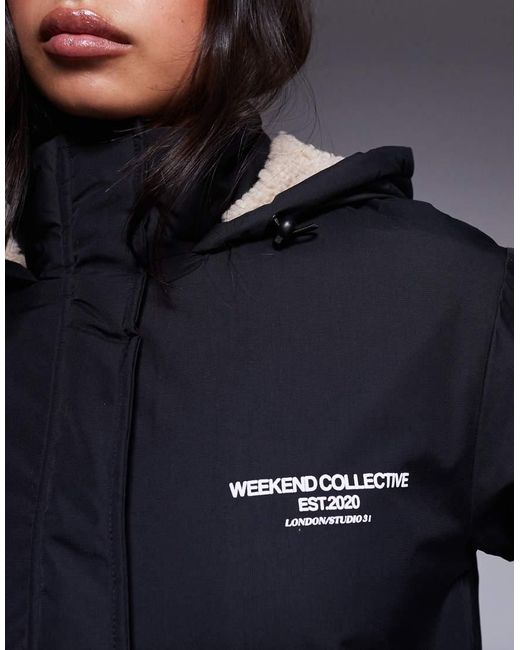 ASOS Blue Weekend Collective Longline Coat With Borg Lining And Graphic