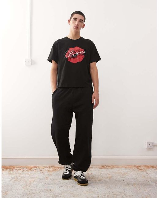 Camiseta Negra De Corte Slim Con Estampado Gráfico De Collusion de hombre de color Black