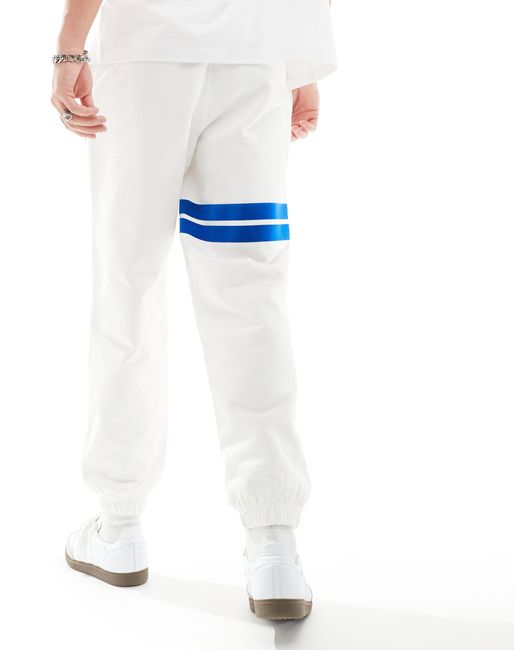 Joggers s con logo y rayas en contraste Lacoste de hombre de color White