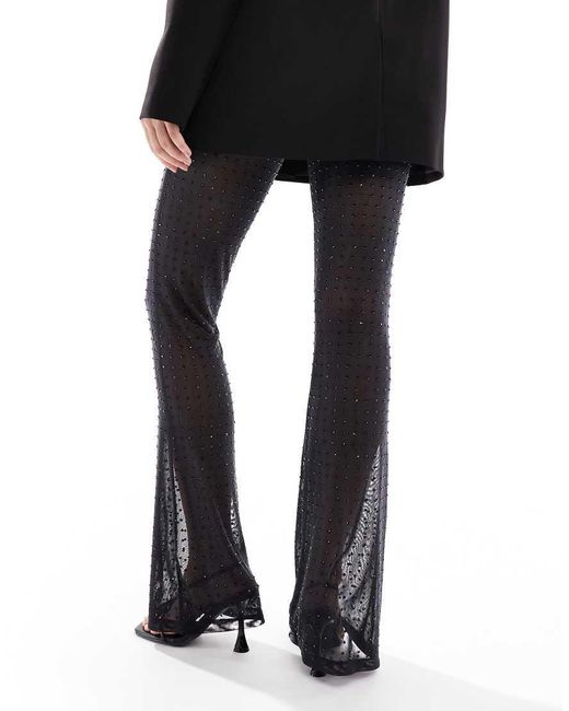 Pantalones De Campana Negros Con Diseño Termosellado De Malla De ASOS de color Black