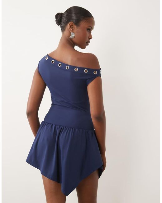The Frolic Blue Exclusive Slinky Eyelet Detail Asymmetric Pleated Skirt Mini Dress