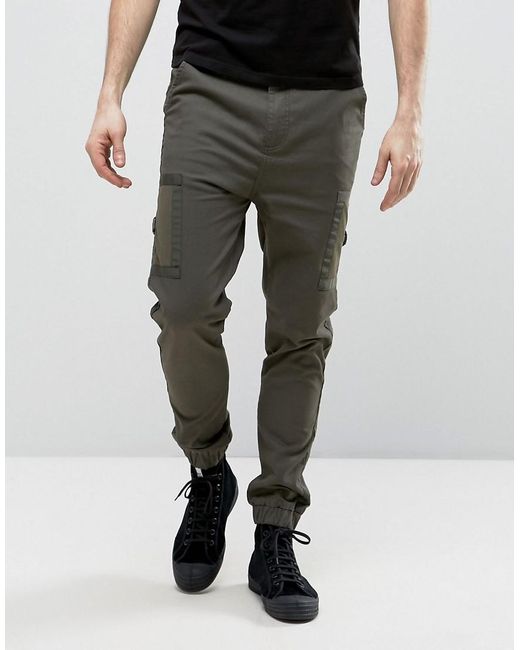 Joggers & Sweatpants. Your street-inspired style isn’t complete unless you’ve got a pair of our men’s joggers on hand. This collection of jogger pants will instantly turn your style up a notch with their skinny fit, elasticized cuffs, and comfortable drawstring waist. Highlight your favorite sneakers, such as a pair of Nike Janoski kicks, when you slip on a pair of our joggers.
