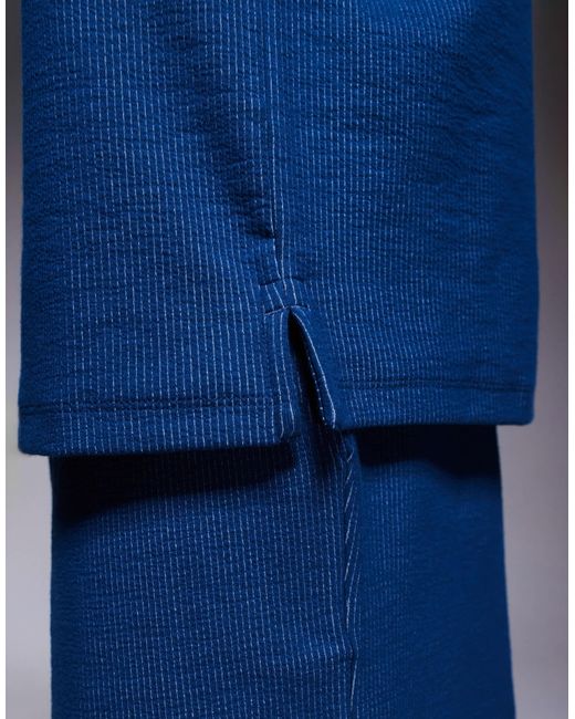 ADPT Blue Split Neck Texture Polo Shirt for men
