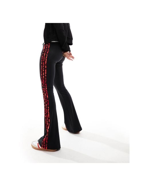 Adidas Originals Black – leopard luxe – ausgestellte leggings