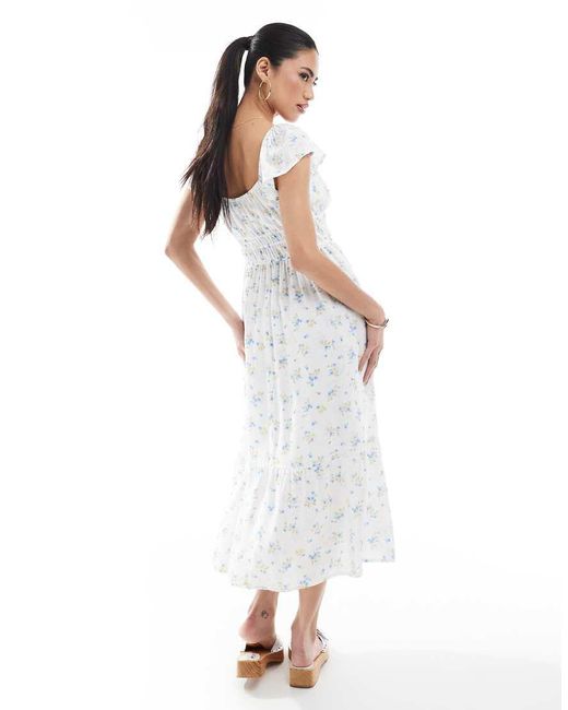 Vestido Midi De Manga Corta De Estilo Mesonera Con Estampado Floral Azul Y Abertura De Hollister de color White