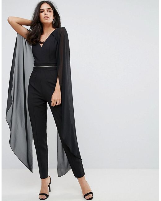 Forever Unique Jumpsuit With Chiffon Cape in Black | Lyst Canada