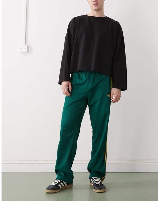 Adidas Originals Green Firebird Loose Pinstripes Track Pants for men