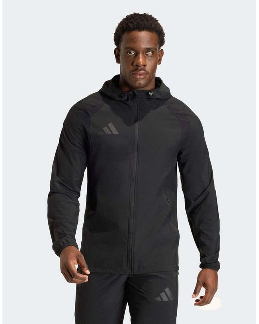 Adidas Originals Black Tiro Travel Windbreaker Jacket for men