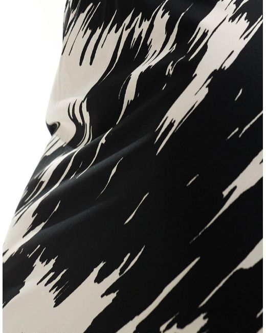 Falda midi negra con diseño estampado New Look de color Black