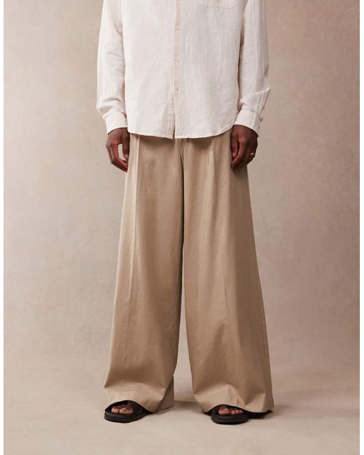 ASOS Nette Broek Van Linnenmix Met Wijde Pijpen En Plooien Aan De Voorkant in het Natural voor heren