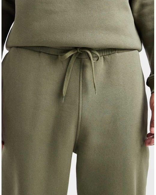 Joggers Caquis Básicos De Corte Tapered De -Verde ASOS de hombre de color Green