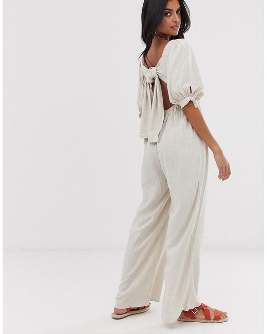cream jumpsuit with sleeves