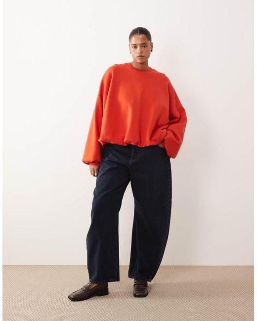 ARRANGE Red Curve Bubble Hem Sweatshirt