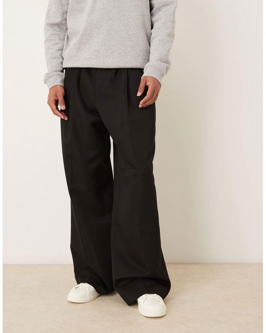 Pantalon large élégant à triple plis ASOS pour homme en coloris Black