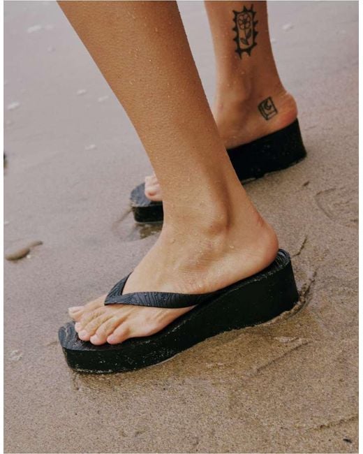 Sleeper Black High Platform Flip Flops