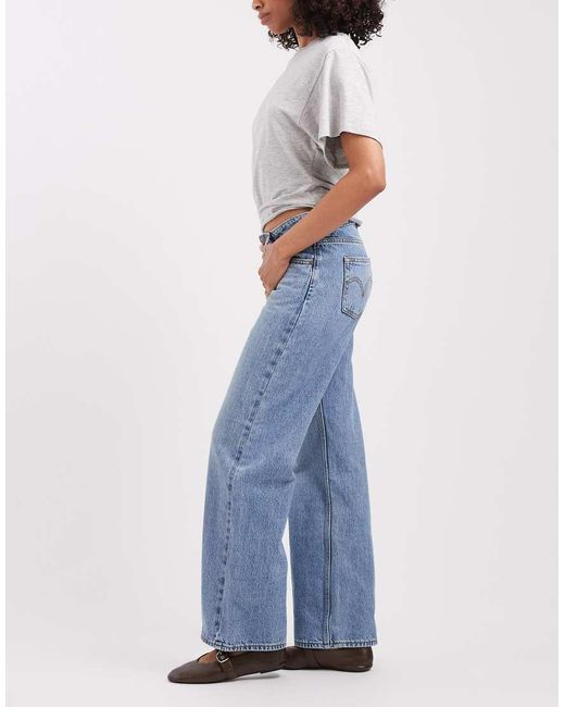 Jeans Ampi A Vita Super Bassa Slavato di Levi's in Blue