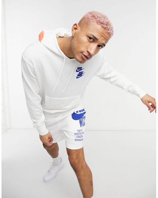 Nike World Tour Pack Graphic Hoodie in White for Men | Lyst Canada