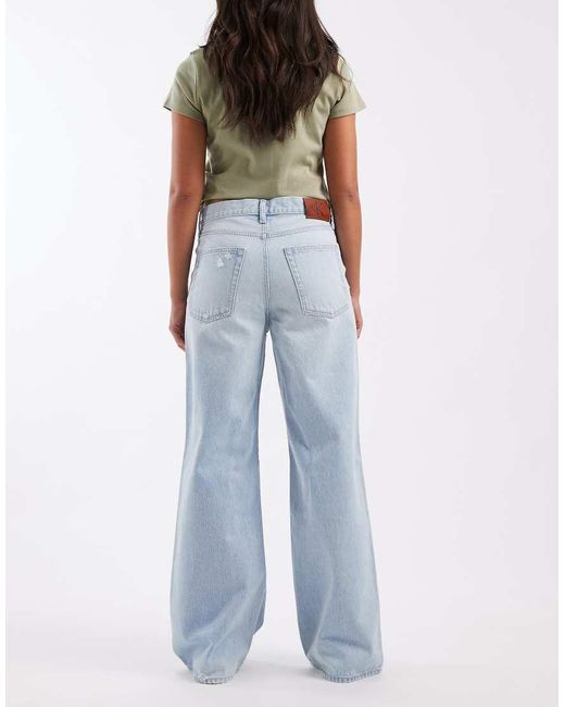 Calvin Klein Blue Low Rise Baggy Jeans With Rip Details