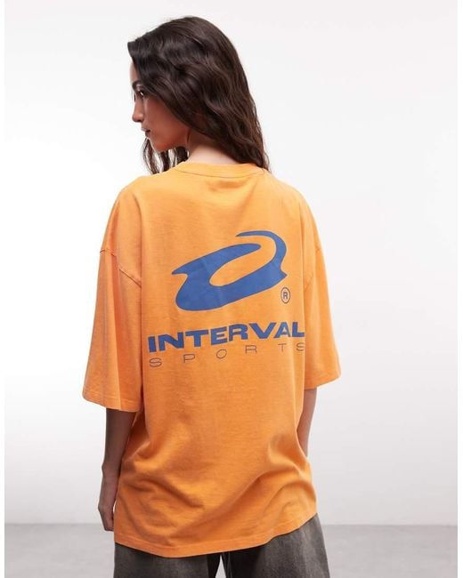 Collusion Orange Unisex Long Sleeve T-shirt With Blue Print