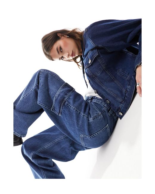 Dr. Denim Blue – hill – cargo-jeans mit taschen, niedrigem bund und lässigem, weitem, geradem schnitt