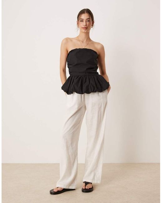 Glamorous Black Ruched Puffball Peplum Top