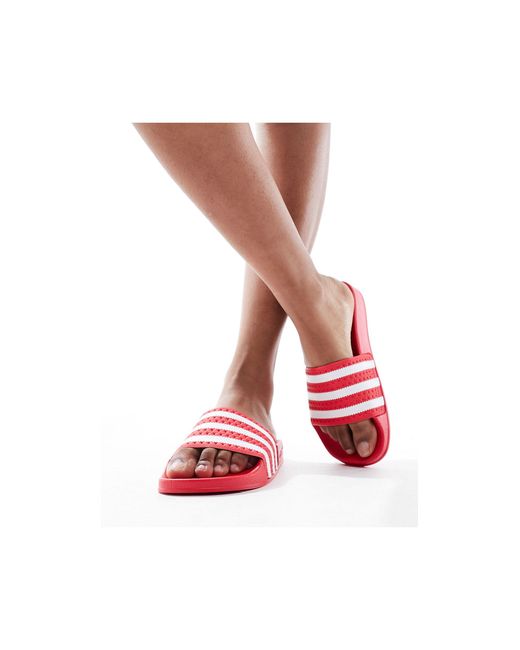Adilette - claquettes - rouge corail Adidas Originals en coloris Red