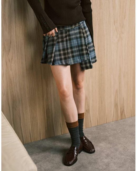 Monki Natural Pleated Mini Skirt With Asymmetric Hem