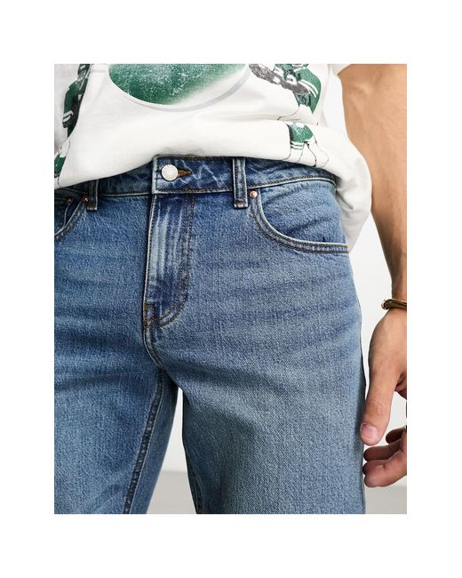 Jeans slim elasticizzati vintage tinto di ASOS in Blue da Uomo