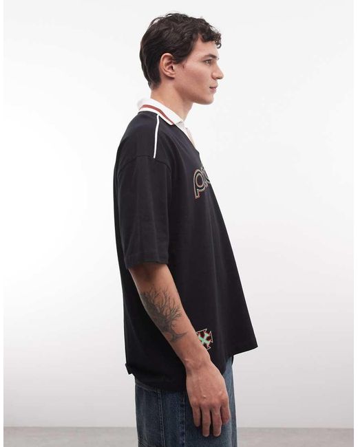 ASOS Black Oversized Polo With Portugal Soccer Graphic for men