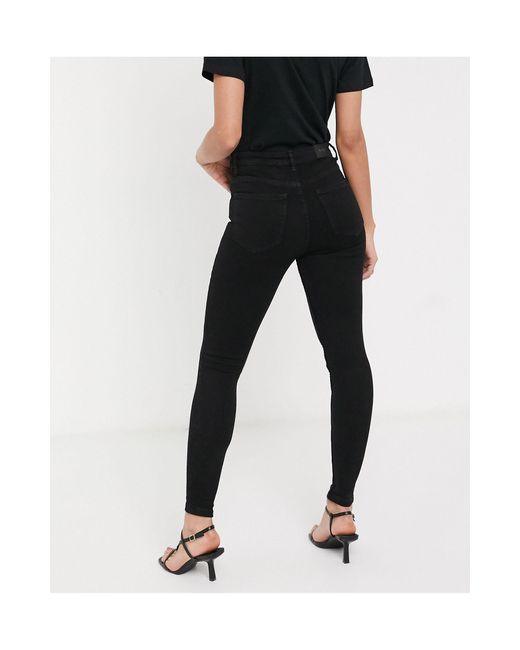 Jeans skinny a vita alta neri di Bershka in Nero - 67% di sconto | Lyst
