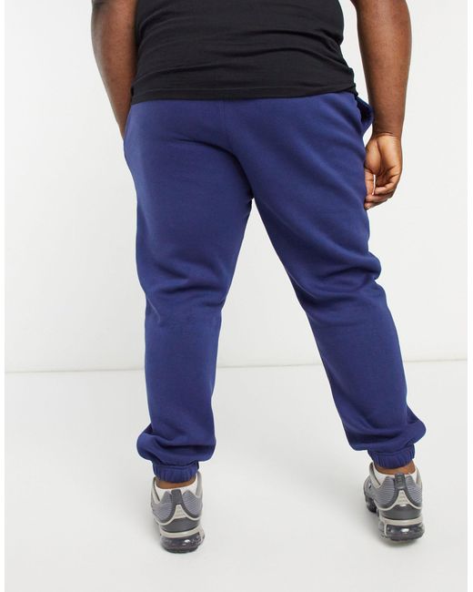 nike club casual fit cuffed joggers in khaki